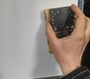 sanding canvas board